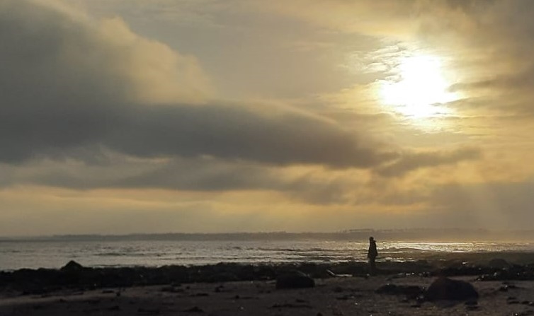 William Fagus on beach in golden sunset