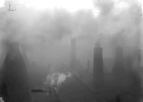 Smoky Midlands city with chimneys